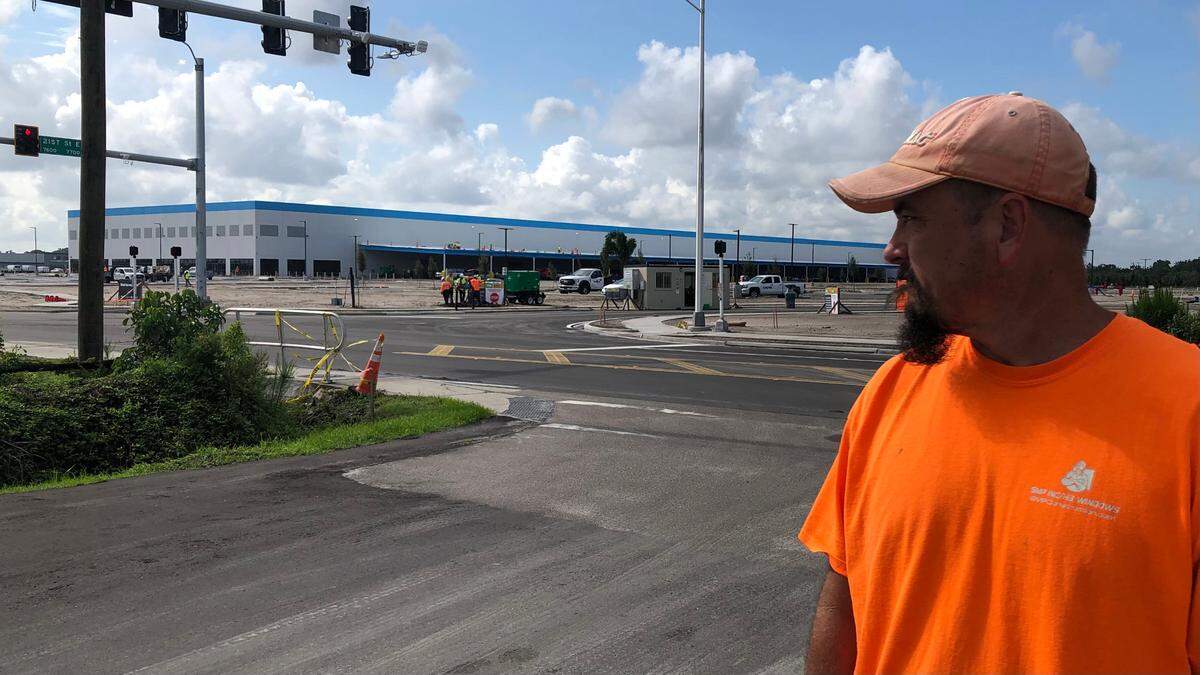 7/8/2021--Shadrach Thien, owner of SMP Maintenance, watched in amazement as Amazon’s new distribution center went up almost over night at 2200 Tallevast Road, in southern Manatee County.