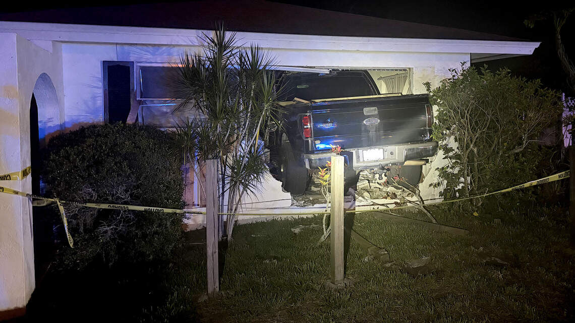 Pickup truck crashes into Manatee County home, trapping man inside, FHP says