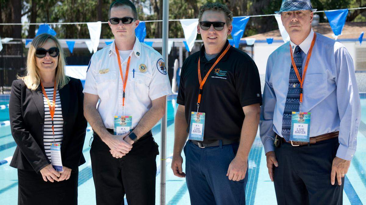 (From left) Petra Vybiralova, Chief Sean Dwyer, Matthew Porter and Capt. Dennis Romano.  They gathered at the John H. Marble Pool to speak with reporters about water safety and drowning prevention on Friday afternoon.