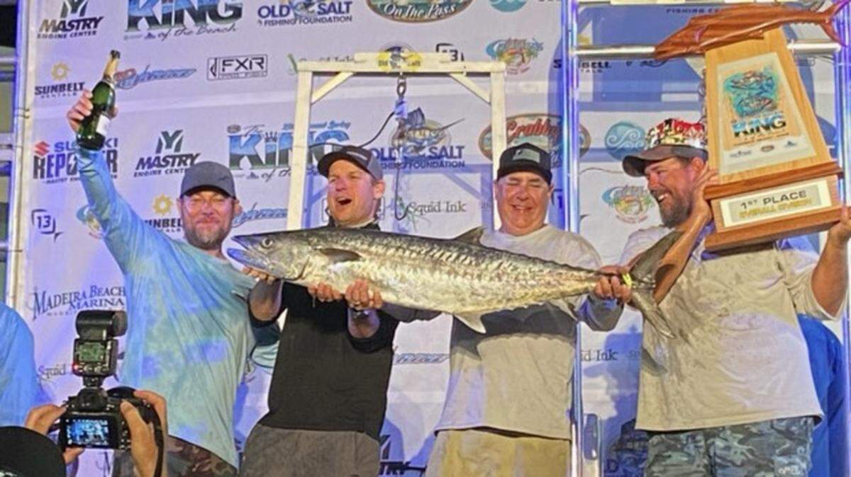 Team Lagerhead shows off their winning 38.87-pound king mackerel at the 28th annual Old Salt Spring King of the Beach Fishing Tournament on April 30, 2022. 