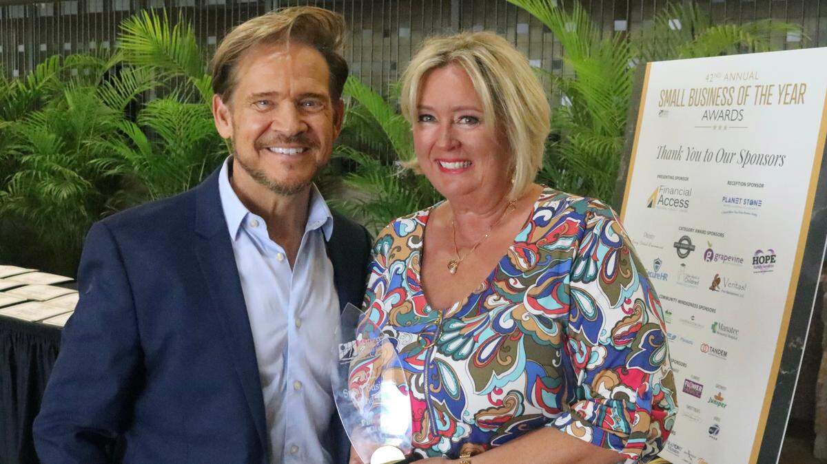 Mike and Jenny Schenk are expanding Pineapple Kitchen’s adult interactive murder mystery dinner program. They are shown Aug. 18, 2022, after being recognized as a Manatee Chamber of Commerce Small Business of the Year.