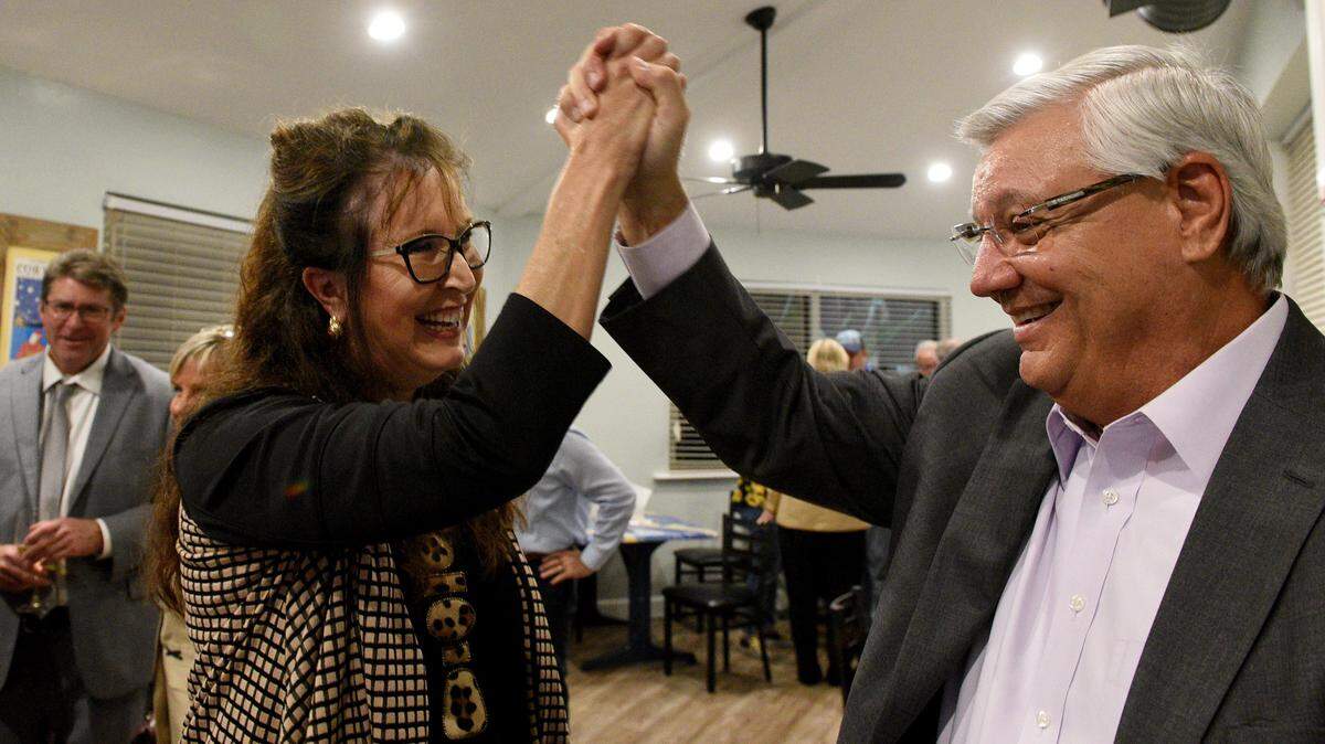 11/02/21—Manatee School District Superintendent Cynthia Saunders and Ernie Withers, the Forward Manatee co-chair, react after the election results come in, showing that the school district referendum extending a 1-mill tax had passed.
