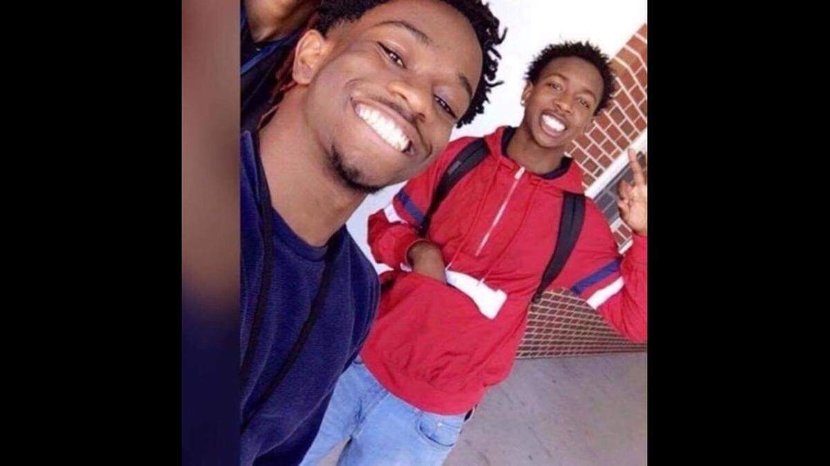 Joe Clejuste, left, is wanted in connection to the shooting that left two teens dead, including Kemundrey Pittmon, pictured at right.