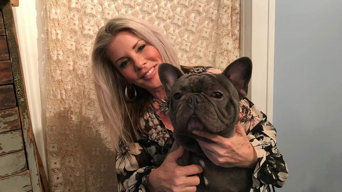 Gypsea Soul owner Ashley Louda is shown with Sebastian, a French bulldog and store mascot. The new business has its grand opening starting at 2 p.m. Saturday, April 6, at 615 15th St. W., Bradenton.