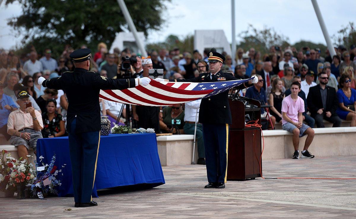 Thousands arrived to pay respects to a veteran they never met; Edward Pearson, at the Sarasota National Cemetery on Tuesday.