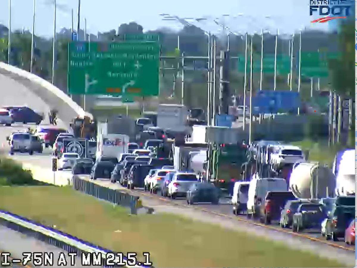 A traffic camera shows vehicles being diverted onto University Parkway after a fatal crash on Interstate 75 on Tuesday, Aug. 16, 2022.