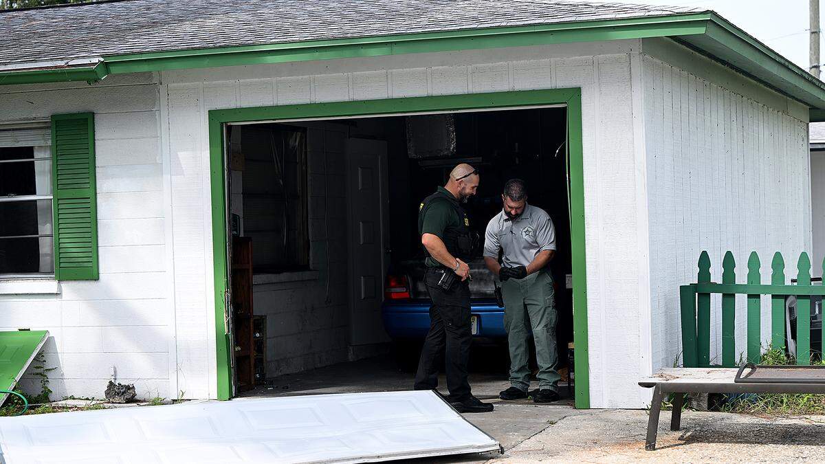 Manatee County Sheriff’s Office deputies continue to gather evidence and investigate at the scene of an hours-long standoff in the 800 block of 63rd Avenue West on September 11, 2025. While attempting to serve a warrant related to armed robbery, the suspect fired shots at deputies, the sheriff’s office said.