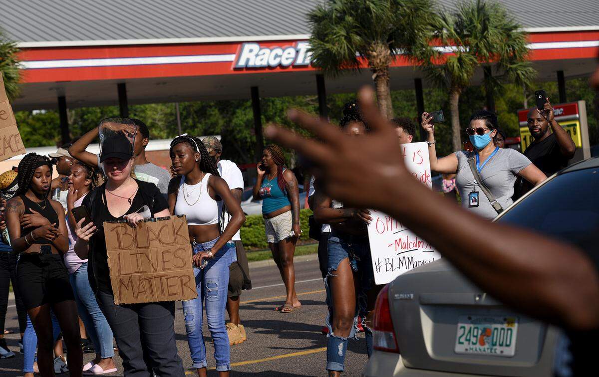 Bradenton Herald reporter Jessica De Leon covers a Black Lives Matter march in Downtown Bradenton in 2021.