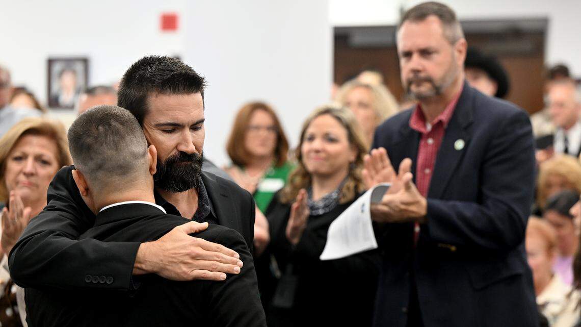 Nicholas and Kiel Felts, Commissioner Carol Ann Felts’ sons, at a meeting of the Manatee County Commission during a tribute to Carol Ann Felts on March 3, 2026.