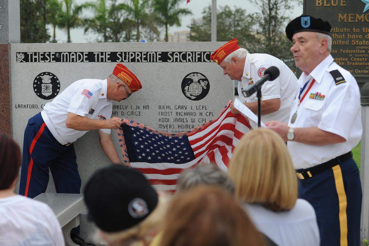 The family of Sgt. John R. Holmes, gathered in 2015 as his name was unveiled on Bradenton’s Vietnam War Honor Roll monument in Veterans Park. Holmes was injured in a mortar attack in 1968 and was in a coma for 33 years. Holmes died from his injuries in 2001. A movement is under way to add a monument to U. S. military members killed on active duty since 1990.