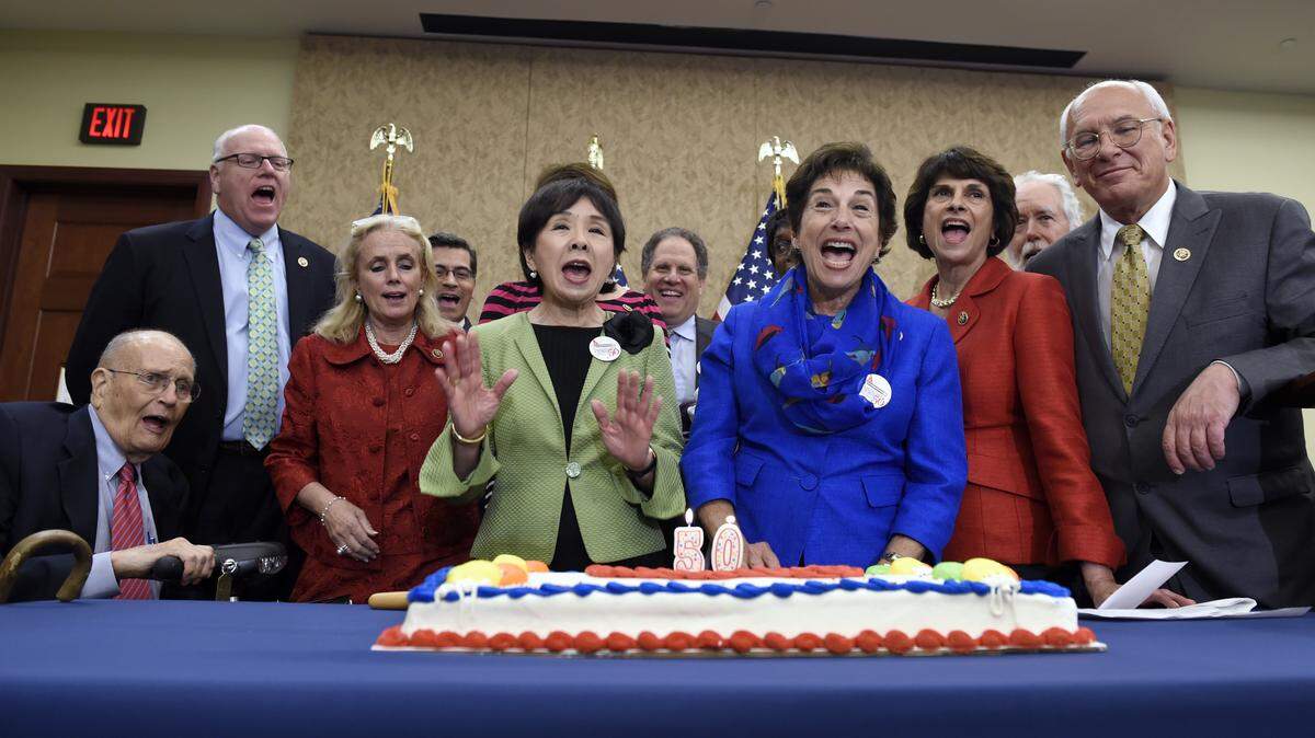 Members of Congress celebrate July 29 during an event marking the 50th anniversary of Medicare and Medicaid on Capitol Hill in Washington. ASSOCIATED PRESS FILE PHOTO
