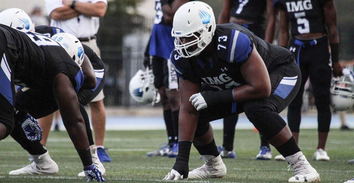 At 6-foot-8 and 391 pounds, IMG Academy tackle Evan Neal is one of the program’s nine four-star senior prospects.