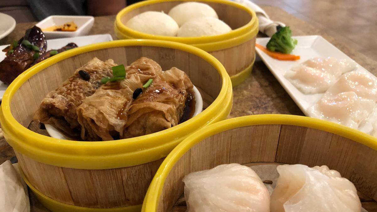 10/29/2021--Among the many offerings at Dim Sum Kitchen, 11544 Palmbrush Trail, Lakewood Ranch, are, from left, top, clockwise, stuffed eggplant with shrimp, house egg custard lava buns, steamed rice roll with shrimp, steamed shrimp dumplings, and steamed bean curd skin roll.