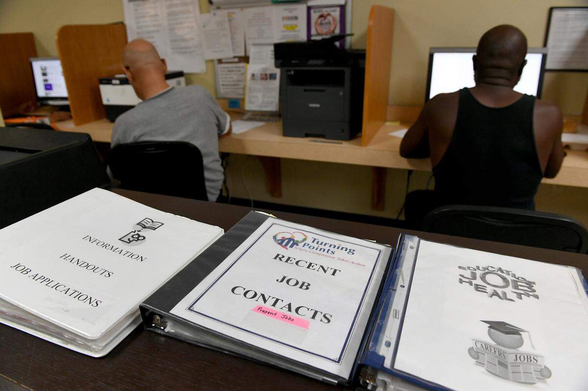 Clients use computers at the Turning Points homeless assistance center.