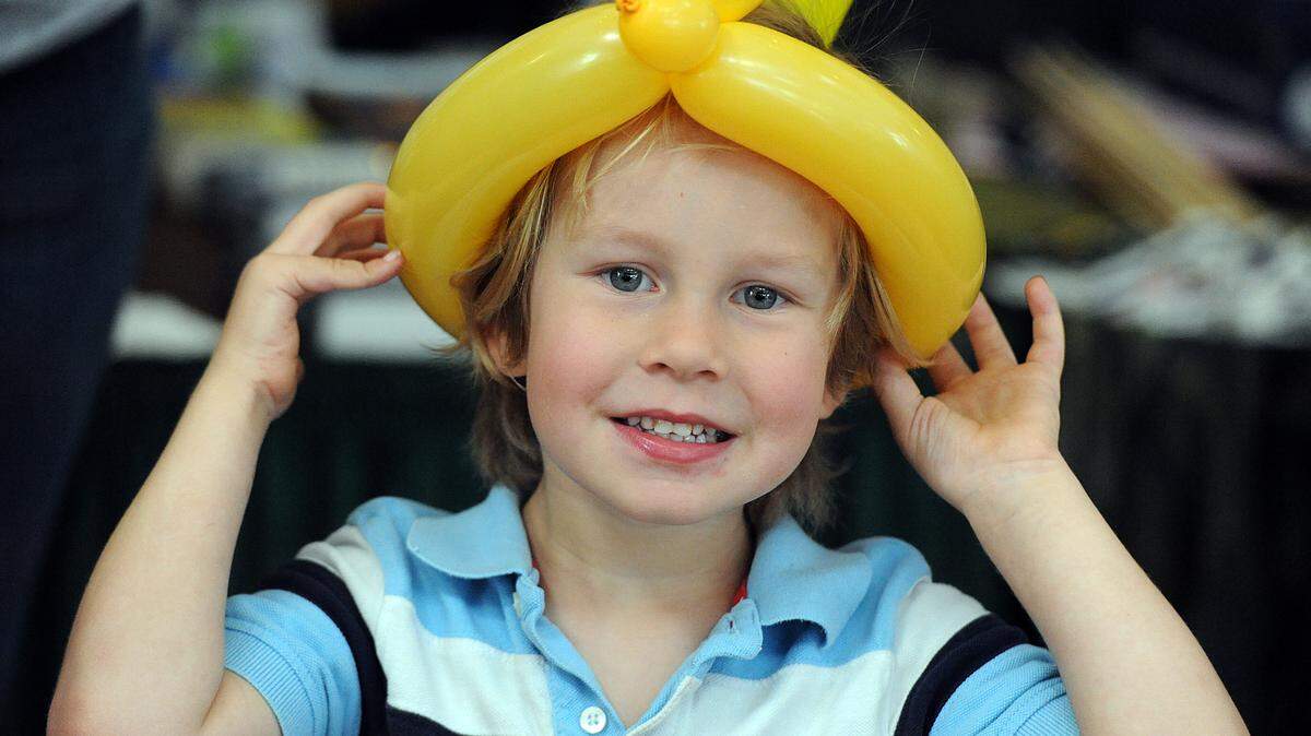 Reece Rambo, 4, has fun at USF Sarasota/Manatee's Veterans Appreciation Day. 
 TIFFANY TOMPKINS-CONDIE/Bradenton Herald