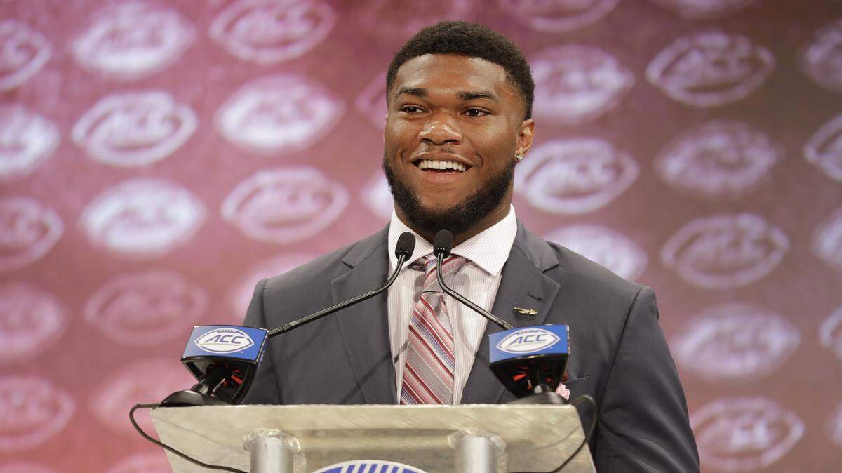 Florida State's Cam Akers answers a question during a news conference at the NCAA Atlantic Coast Conference college football media day in Charlotte, N.C., Thursday, July 19, 2018.