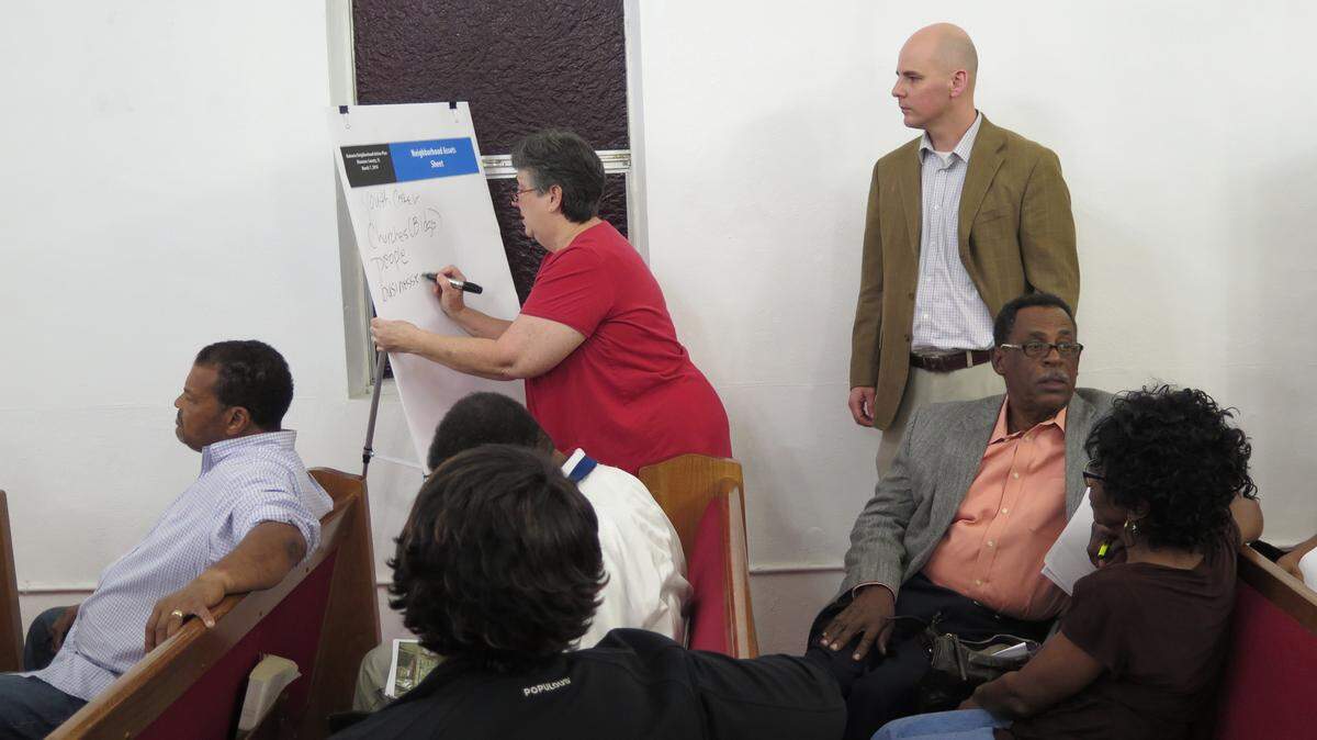 Rubonia residents give their input about what they would like to see happen in the neighborhood during a community meeting Monday. 
 CLAIRE ARONSON/Bradenton Herald