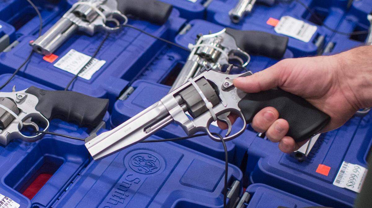 Handguns on display during the Nation's Gun Show at the Dulles Expo Center in Chantilly on Saturday. 
 Photo by: Jabin Botsford -- The Washington Post