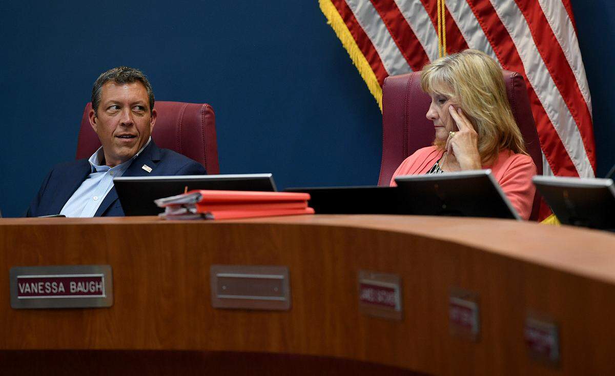 08/10/21—County Commissioners George Kruse and Vanessa Baugh during a meeting to vote on a proposed a county ordinance banning the retail sale of cats and dogs.
