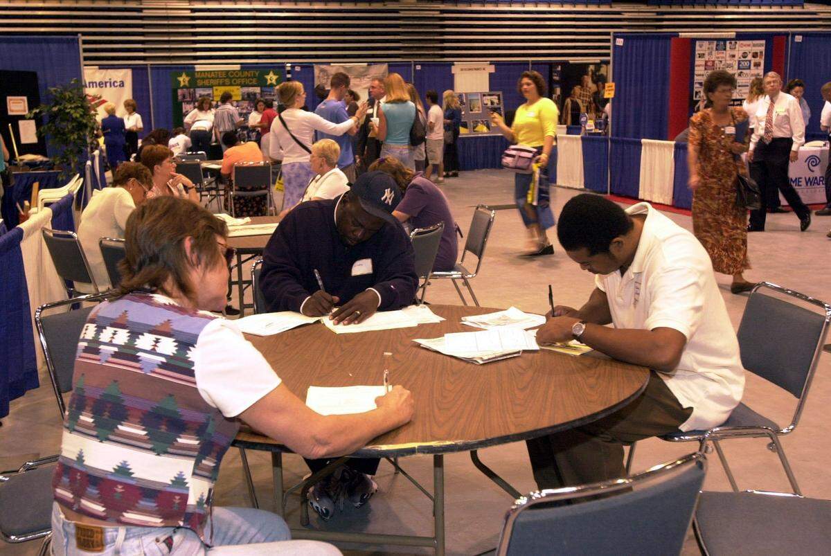 A virtual job fair planned for Aug. 18 by CareerSource Suncoast will help protect employers and job seekers during the COVID-19 pandemic. Traditional in-person job fairs, shown above, are not practical during a pandemic.