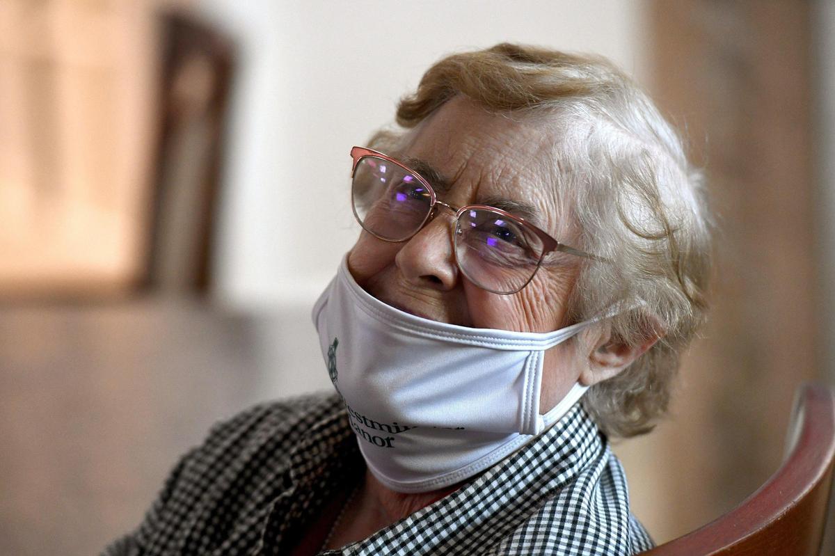 01/05/20--Mary Jane Tenny, 86, waits 15 minutes after getting vaccinated with fellow residents of Westminster Manor in Bradenton.