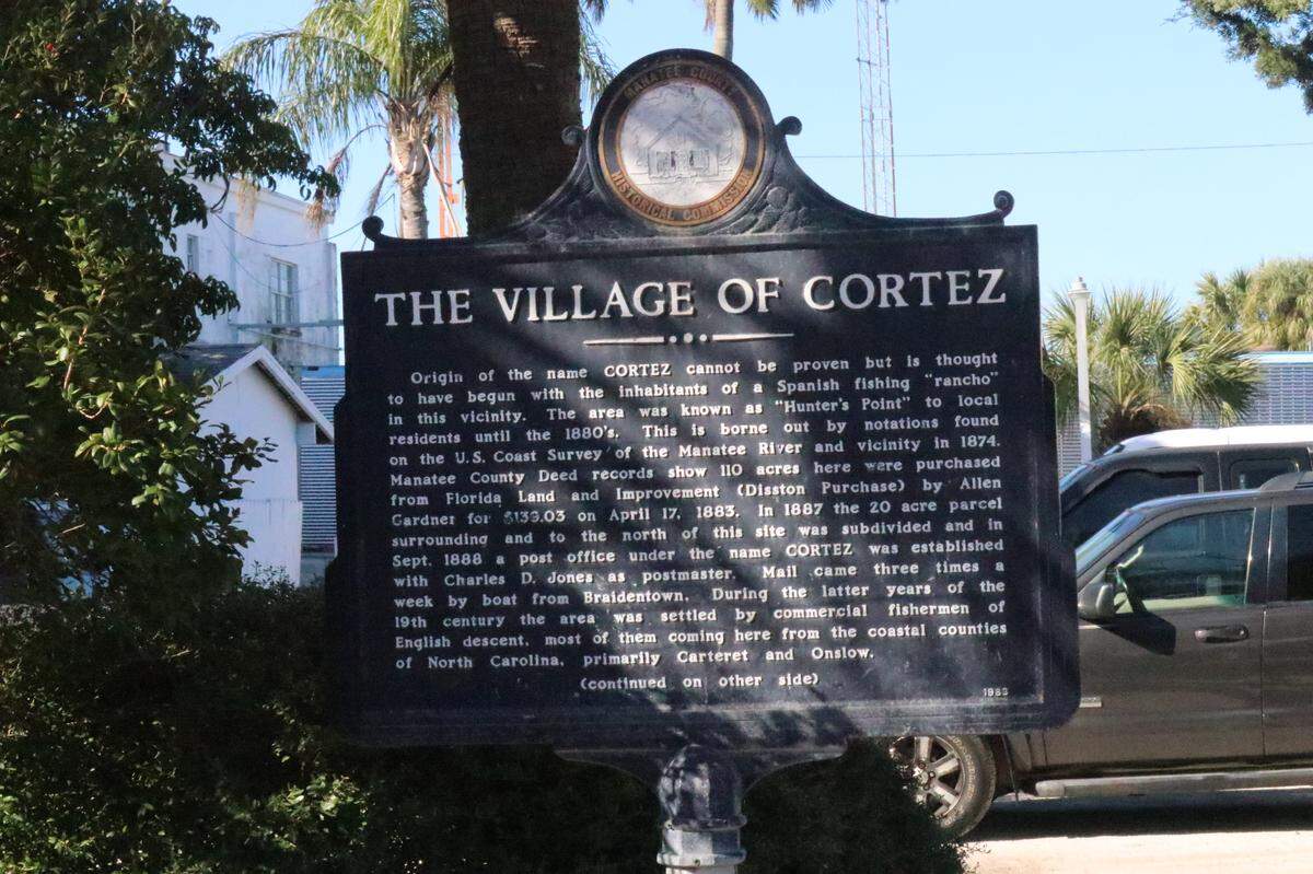 12/30/2020--Karen Bell is leading the fight to save the Guthrie net camp. The Florida Department of Environmental Protection has ordered that it be removed by Jan. 24. Shown above is a historic marker that outlines some of Cortez’s history.