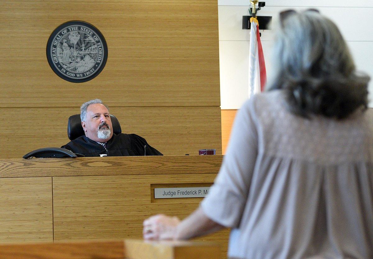 Judge Frederick Mercurio swears in Janet Parsons to testify at the sentencing of Albert Knowles. The judge sentenced him to 20 years in prison plus five years probation for manslaughter.