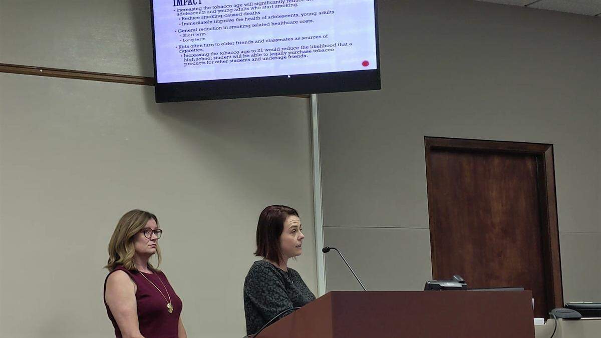 Drug Free Manatee associate director Ally Bergmann, left, and Palmetto assistant city clerk Amber LaRowe, right, advocated for raising the minimum age to buy tobacco products to 21 within city limits at a Palmetto City Commission workshop meeting on October 21, 2019.