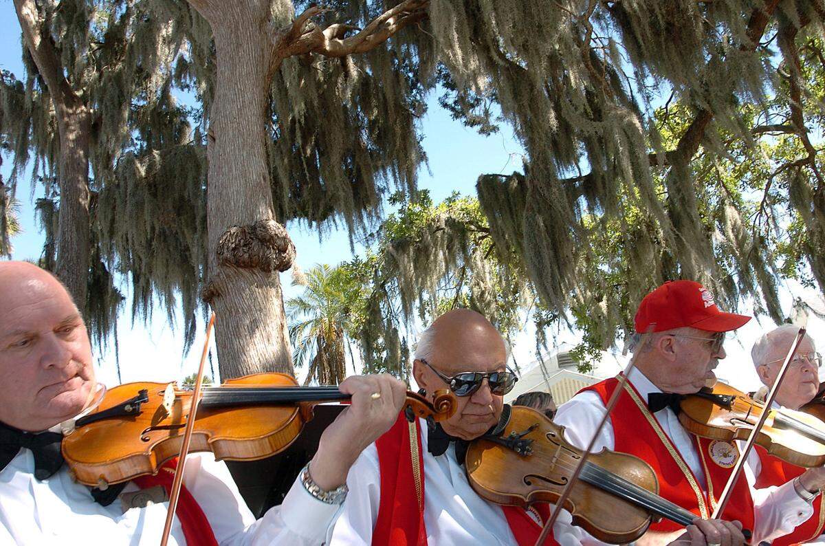 03/15/2006 -- The Suncoast Mummers String Band performed in 2006 during a Heritage Days event at Braden Castle Park along the Manatee River.