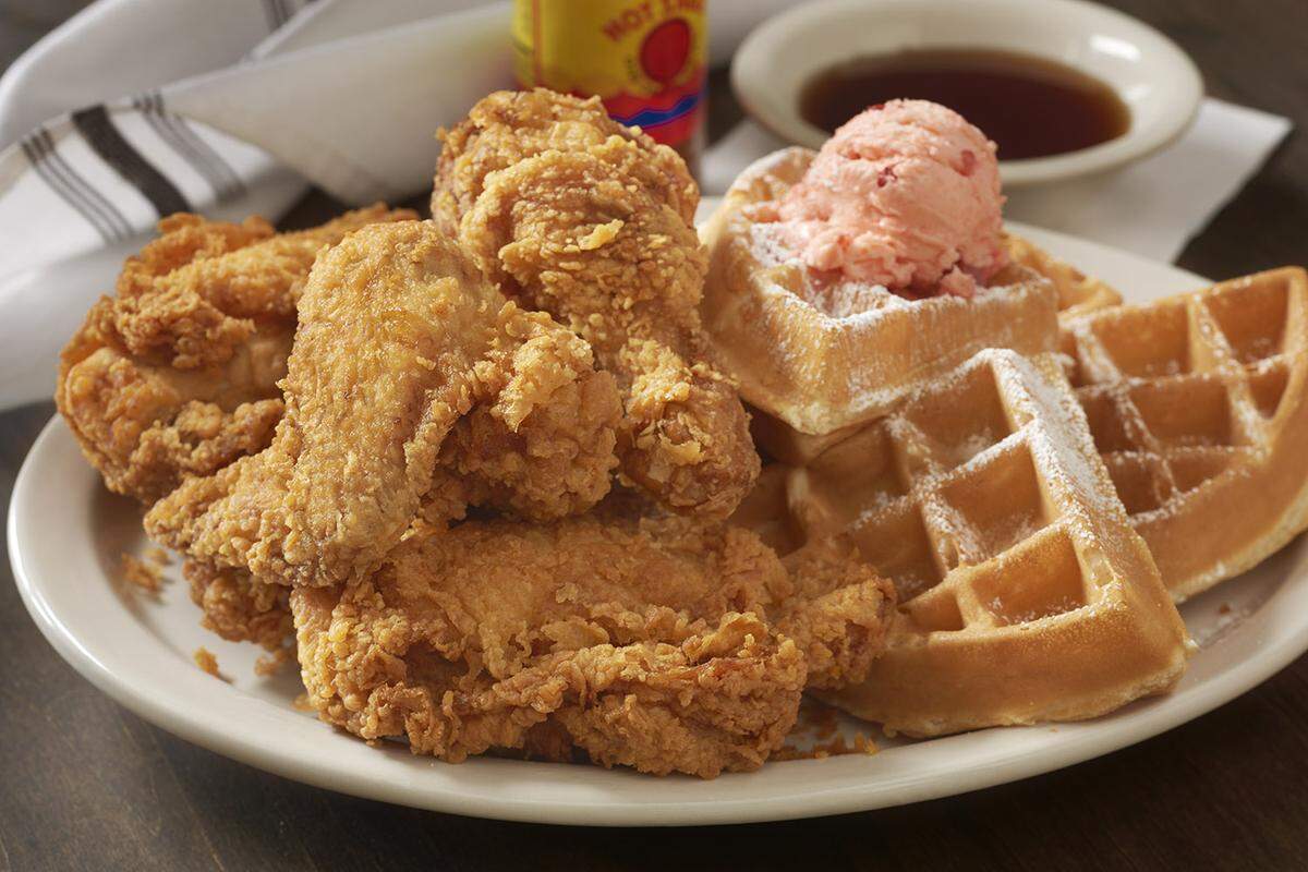 A plate of chicken and waffles at Metro Diner, now open in Manatee County.