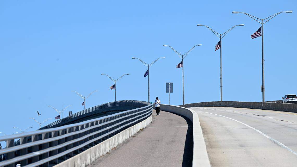 American flags fly from the light posts along the Green Bridge spanning from Bradenton to Palmetto shown on April 24, 2026. On the center pole flies a flag commemorating America’s 250th anniversary.