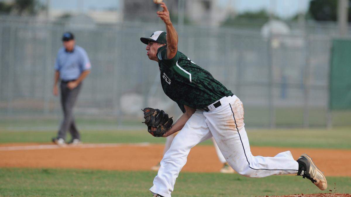 Lakewood Ranch's Colton Zimring pitches as the Lakewood Ranch High Mustangs host the East Lake High Eagles in a Class 8A-Region 2 semifinal Tuesday at Lakewood Ranch High School. 
 GRANT JEFFERIES/Bradenton Herald