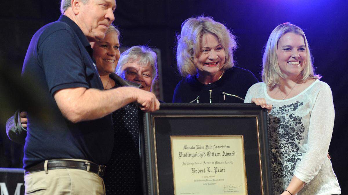 Robert Pelot is pictured with his family after he was named the 2016 Manatee County Distinguished Citizen on Thursday at the Manatee County Fair VIP luncheon in Palmetto. With him are his daughter Erin Daniels, wife Donna, sister Mary Helen Kermode and daughter Jessica Pelot. 
 GRANT JEFFERIES/Bradenton Herald