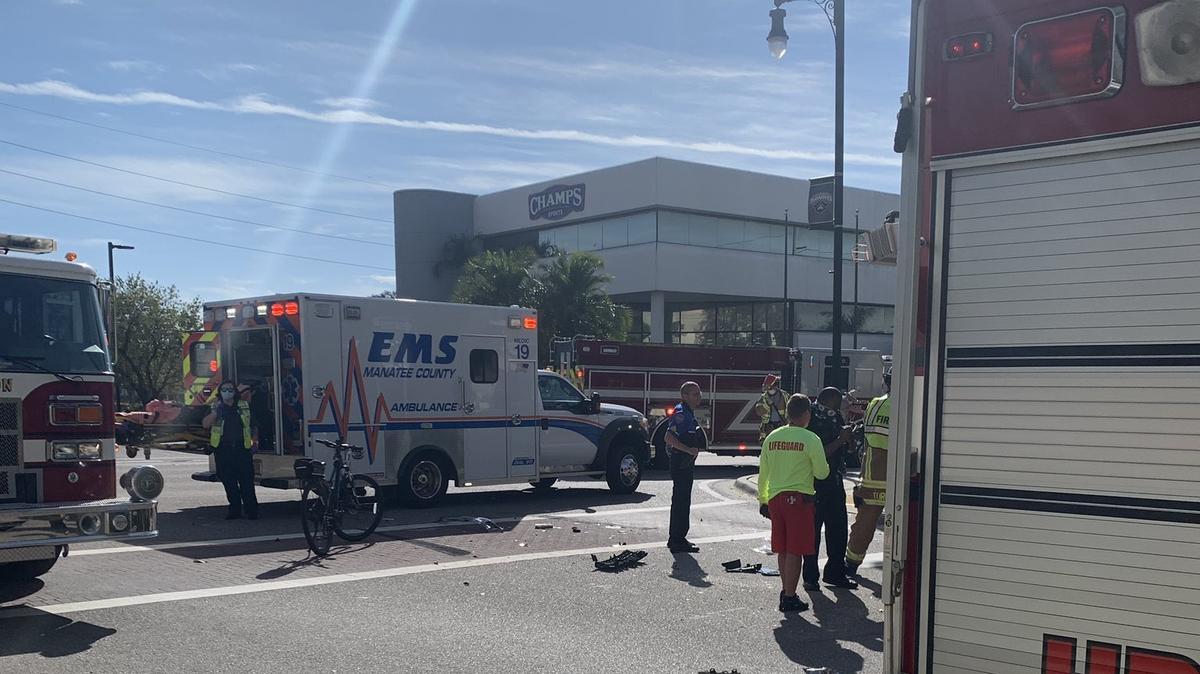 2-10-21--Police and emergency crews respond after a crash involving an overturned vehicle on Manatee Avenue West in Bradenton.