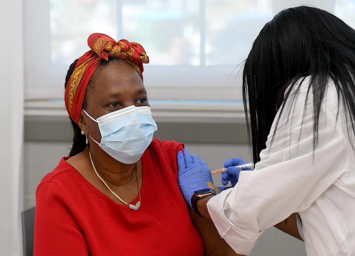 02/10/21--Sharon Thomas receives a vaccine against COVID-19 during an MCR Health vaccination event for area residents at the Rubonia Community Center.
