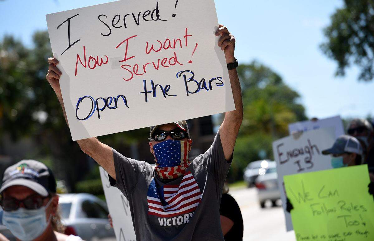 Bar owners in Bradenton area protested on May 18, seeking to reopen their businesses, which have been ordered closed as nonessential during the coronavirus pandemic.