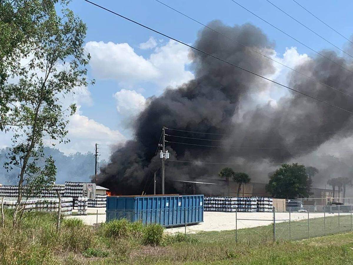 A fire at a propane warehouse in Highlands County on Monday left one worker critically injured and spread destroying more than a dozen homes.