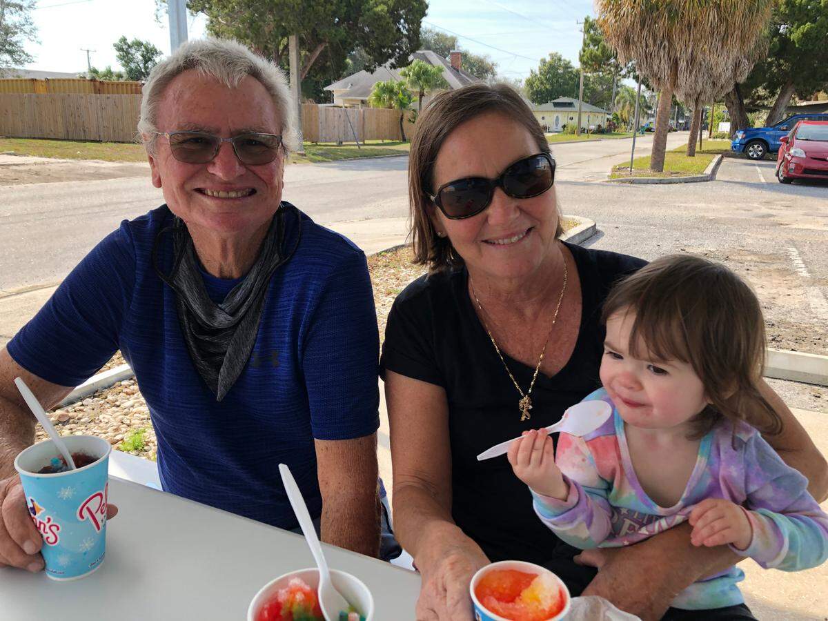 1/27/2021--Jenny and Rich Littlefield, and their granddaughter, Gracie, visited Pelican’s SnoBalls in Palmetto on Wednesday.