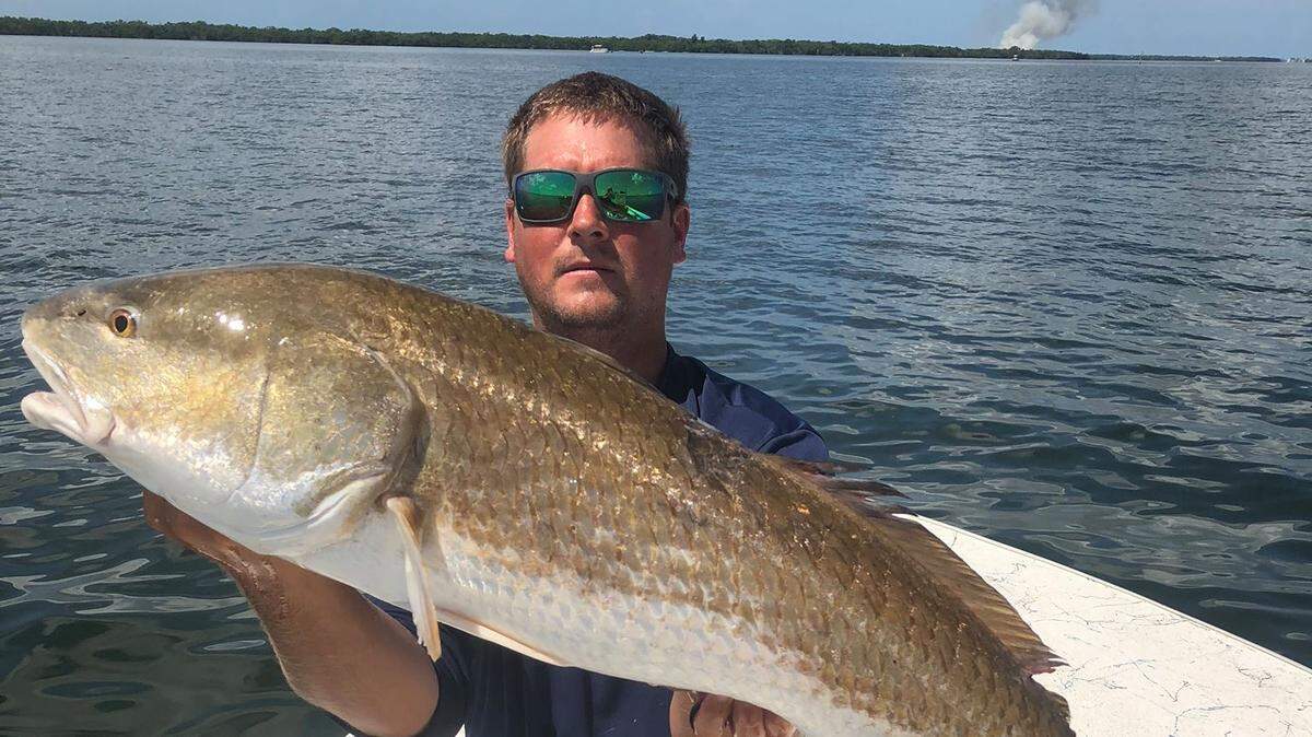 Capt. Griffin Deans with a 40-inch redfish caught in June in Tampa Bay.