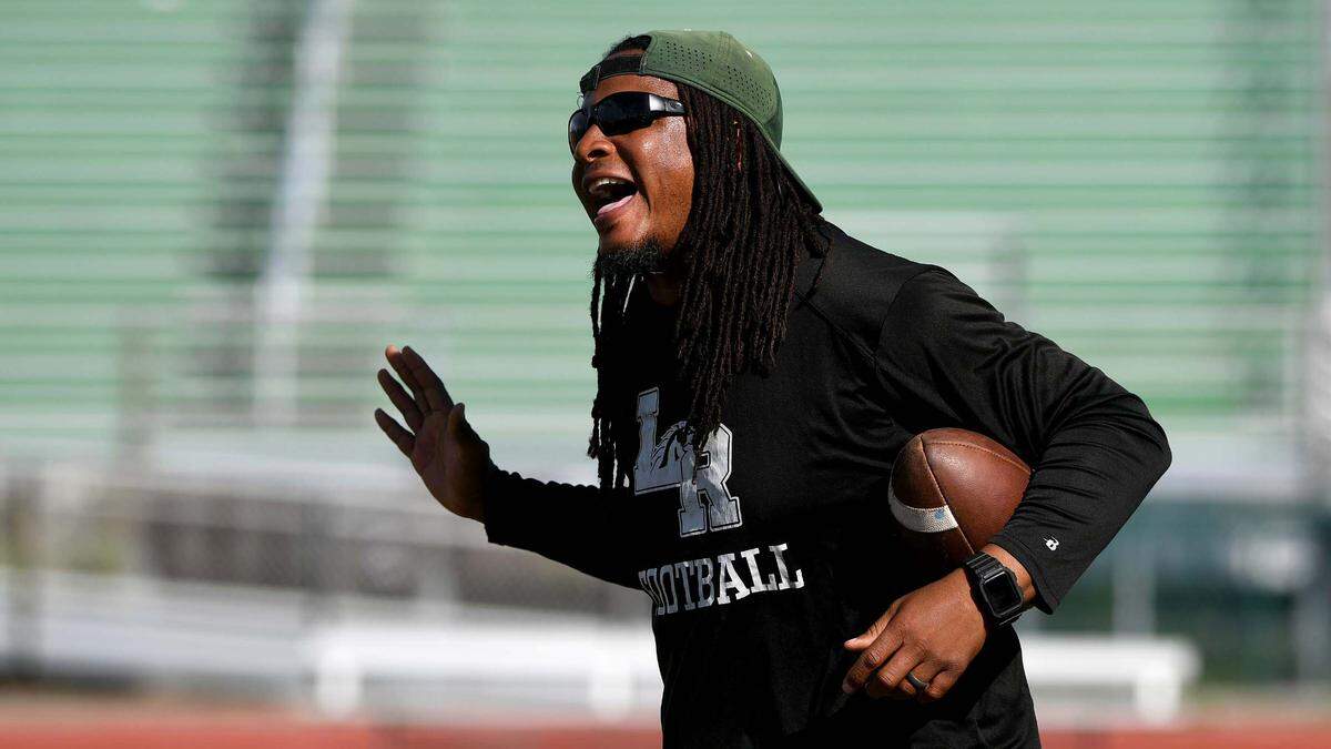 Head football coach Rashad West during Lakewood Ranch High football practice at the stadium field Monday afternoon.