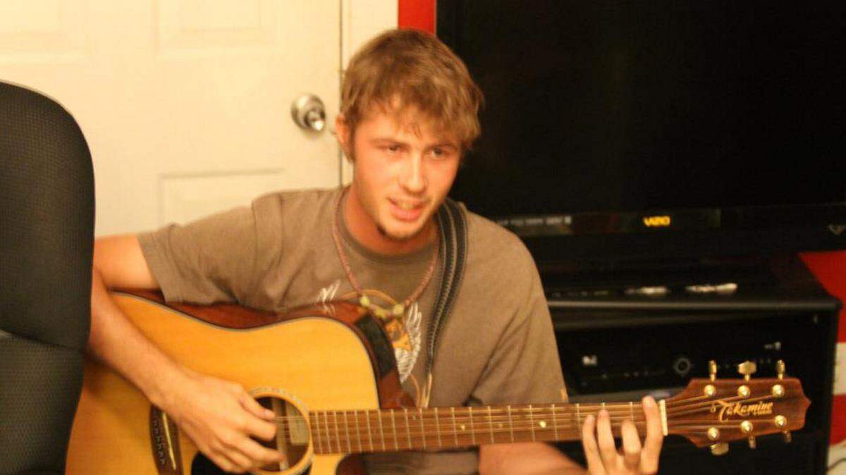 Austin Brunson, 22, who loved to play the guitar, was fatally shot June 7, 2014, by his roommate, Kyle Guessford, according to the Manatee County Sheriff's Office.PROVIDED PHOTO