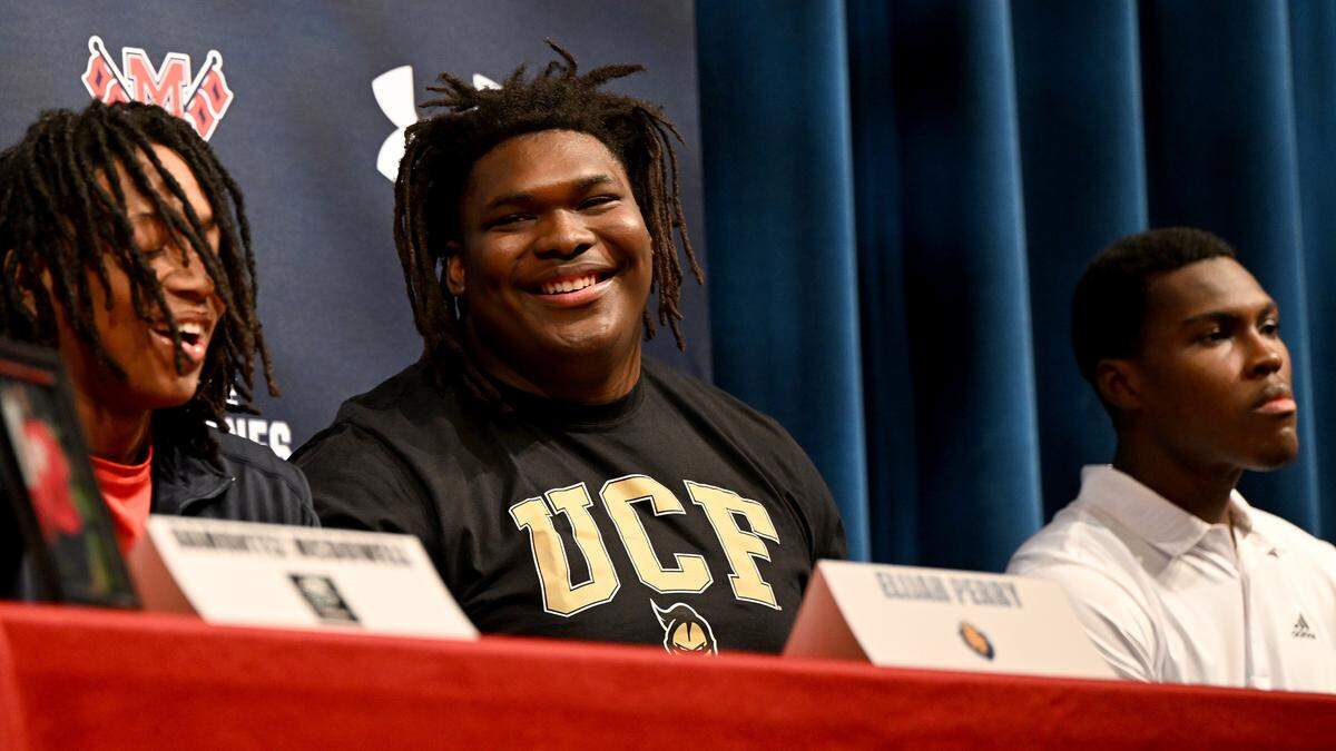 Tyreek’e Robinson smiles after revealing he signed with UCF at Manatee High School on Wednesday, Feb. 7, 2024.