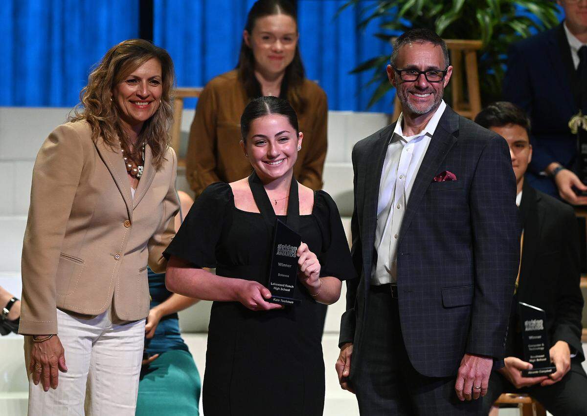2023 Golden Herald Award winner for Science Kate Tuchman with presenters Jackie Barron and Tom McDougal Thursday night.