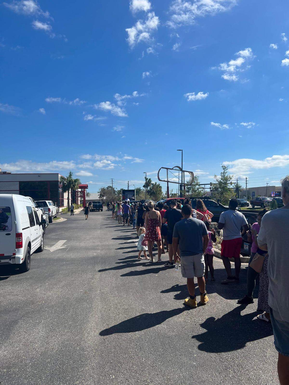 Thousands of people lined up at the Furniture Warehouse in Port Charlotte in the days following Hurricane Ian for water, food, and other household items.