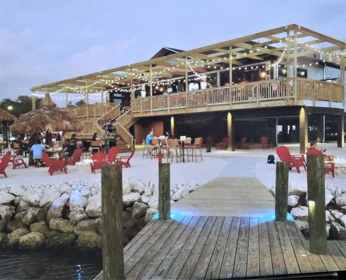 A photograph of the Port Richey Whiskey Joe’s Bar and Grill was on display during the groundbreaking for the Ellenton restaurant on Wednesday, offering a glimpse of what the local eatery will look like.
