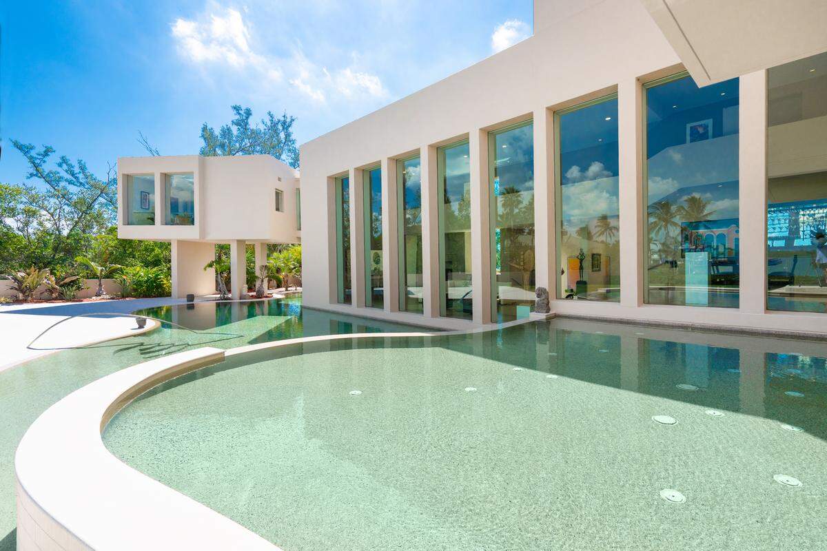 A Manatee County mansion named the “House of Columns,” located at 6610 Gulf of Mexico Drive, Longboat Key, is selling for $22 million. It has a private dock, lagoon-style pool and more.