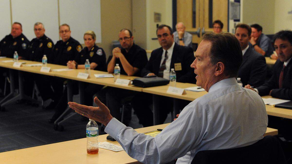 U.S. Rep. Vern Buchanan meets with local mental health officials and law enforcement to address the heroin epidemic in Manatee and Sarasota counties during a roundtable discussion Wednesday at Goodwill Manasota in Bradenton. 
 GRANT JEFFERIES/Bradenton Herald