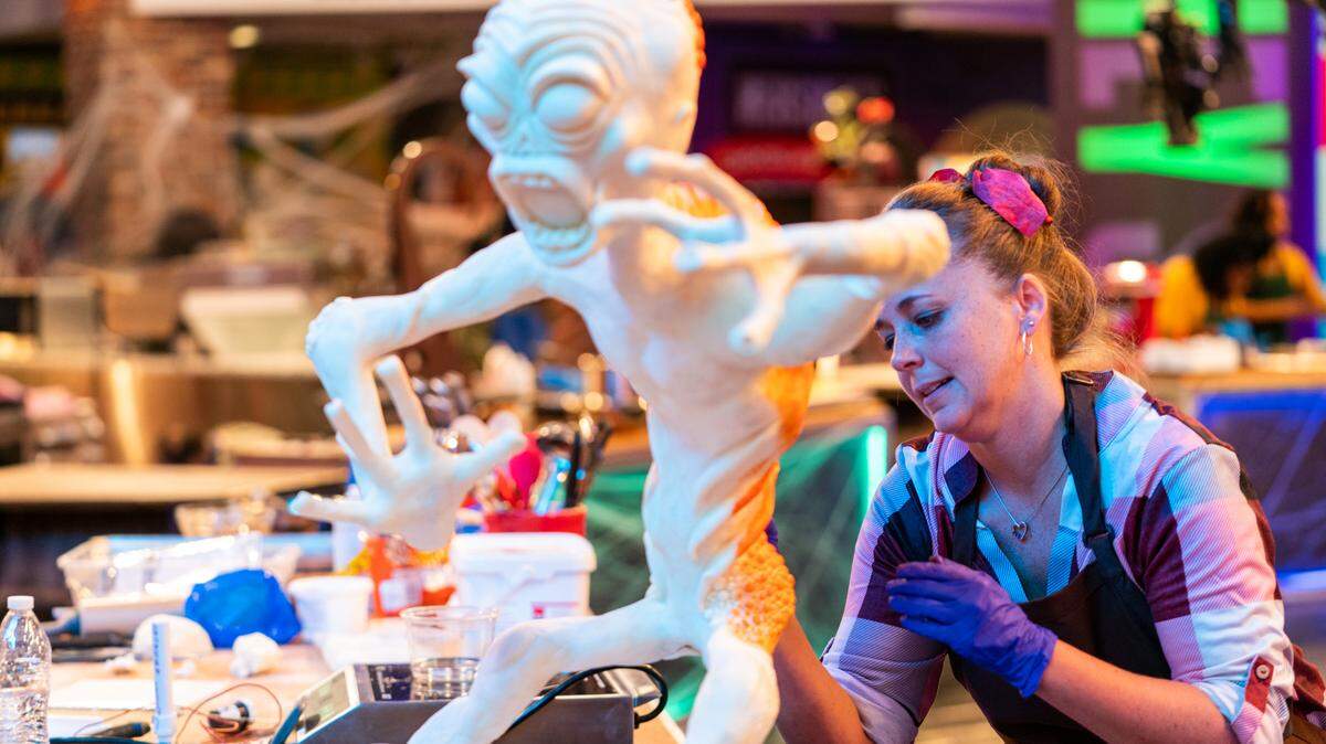 Contestant Lyndsy Velasquez, as seen on the Food Network’s Chocolate Meltdown: Hershey’s After Dark, Season 1, working at her station.