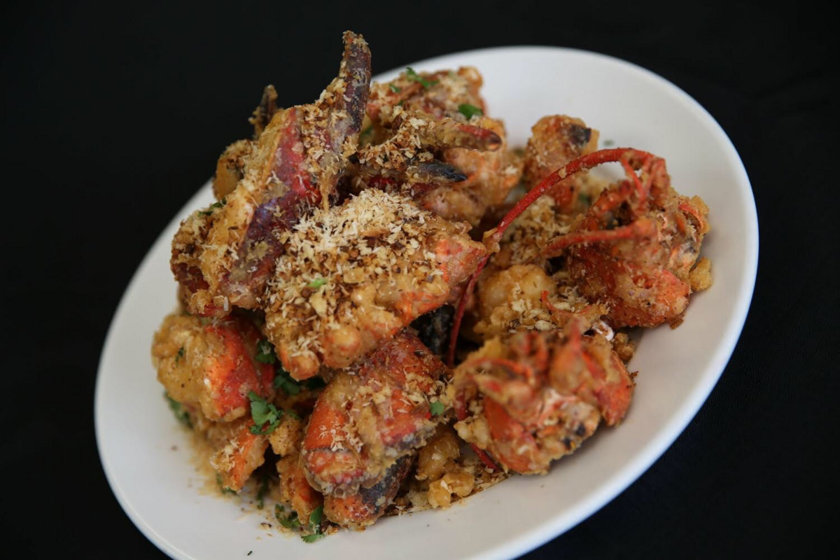 A popular dish at George’s Seafood House is the Golden Sands: crispy fried seafood with toasted coconut, shallots and seasonings.