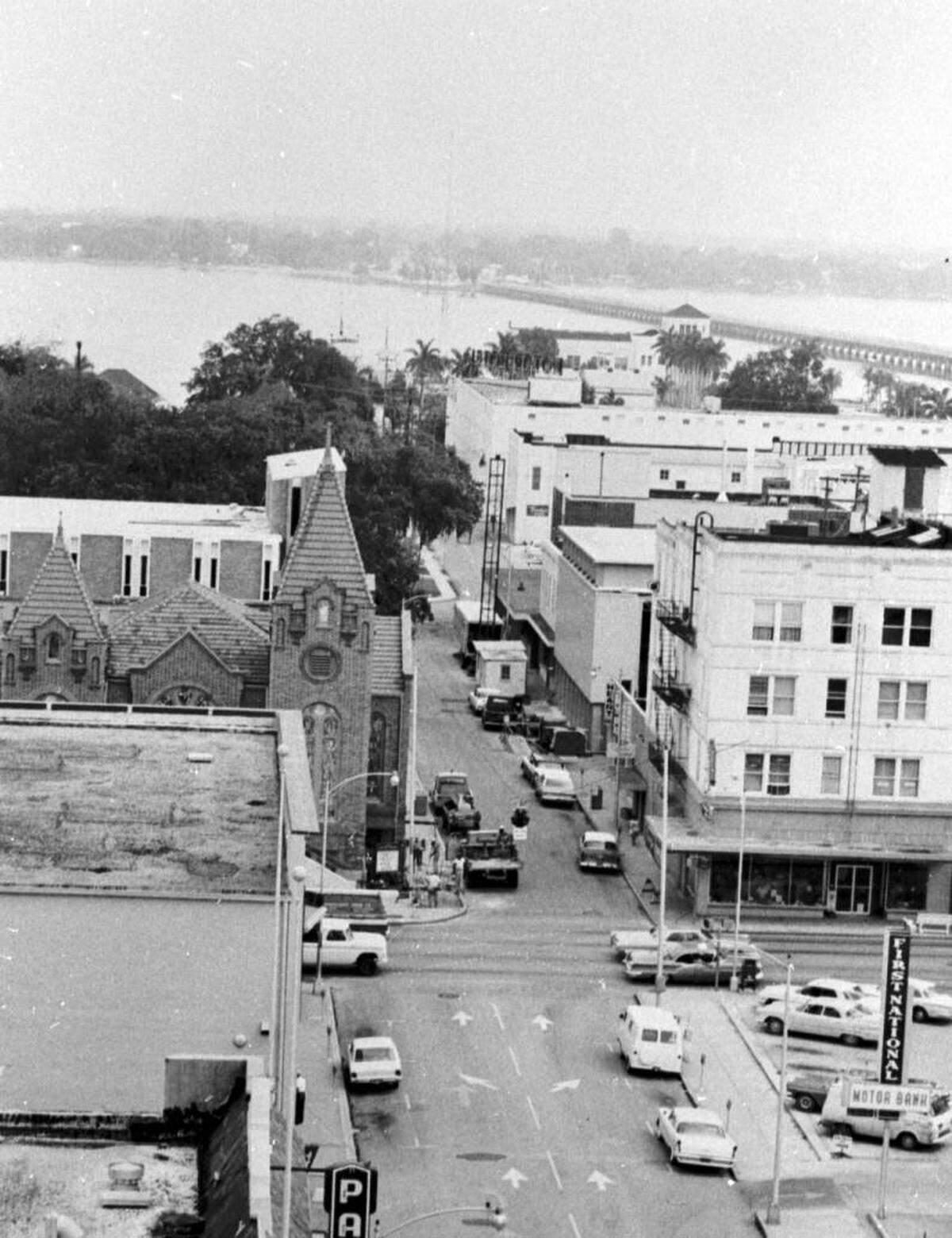 A view looking north down 13th Street West. The First Baptist Church stands on the corner of 13th Street West and Manatee Avenue.
